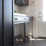 Built-in dog crate seamlessly integrated into kitchen island.