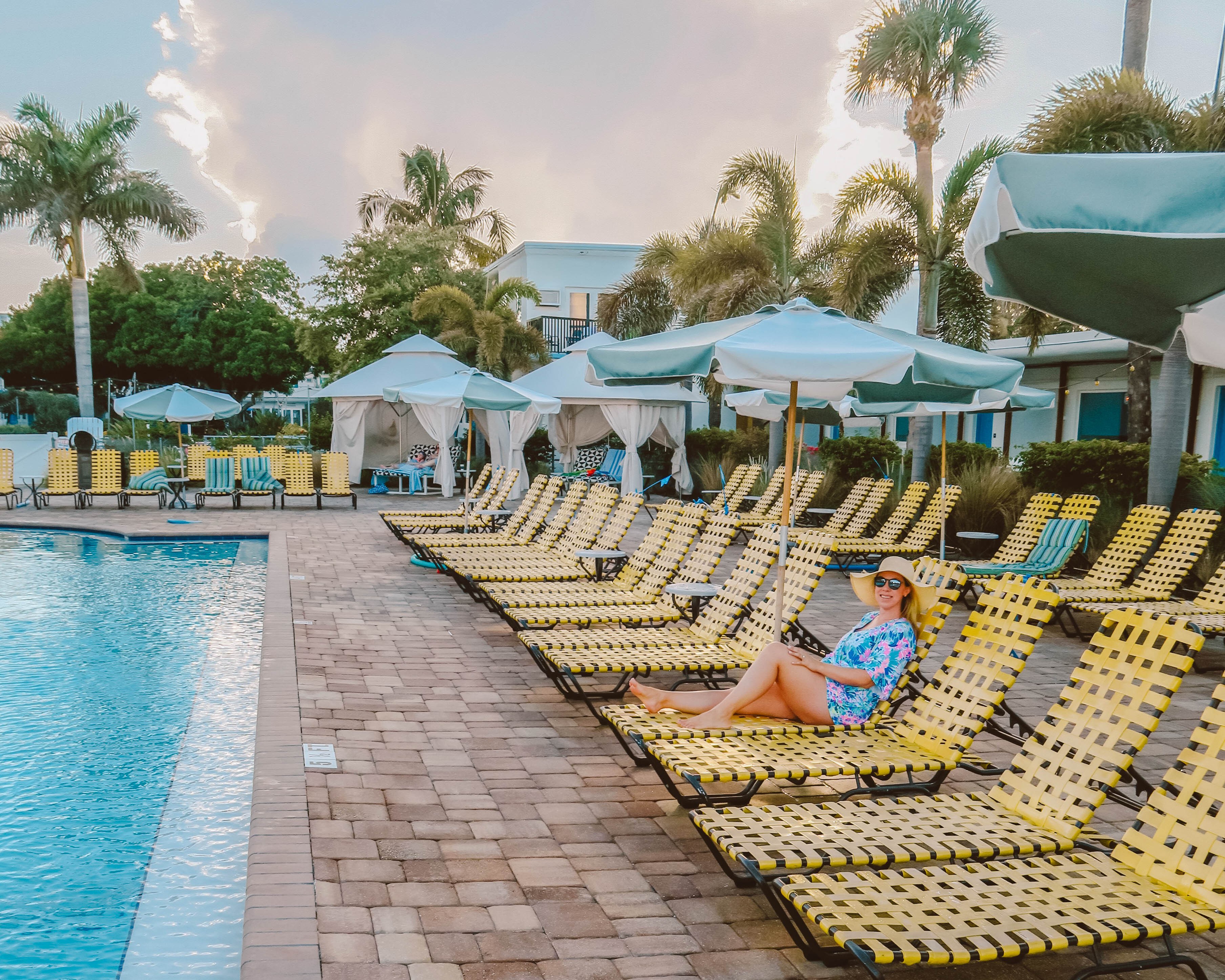 Relaxing by the pool at Postcard Inn on the Beach in St. Pete Beach, Florida