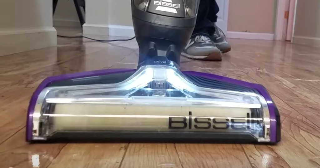 Cleaning floors with the Bissell CrossWave Pet Pro in a studio setting