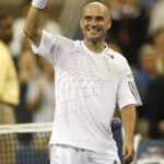 Andre Agassi at the 2006 US Open, a prominent figure in 90s tennis.