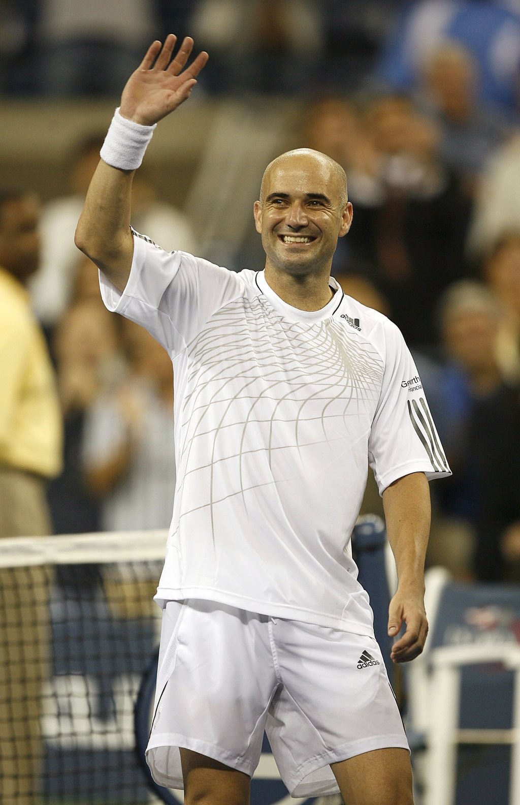 Andre Agassi at the 2006 US Open, a prominent figure in 90s tennis.