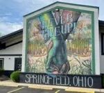 A mural saying "Springfield, Ohio, Everytown, USA"