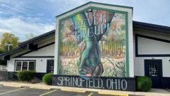 A mural saying "Springfield, Ohio, Everytown, USA"