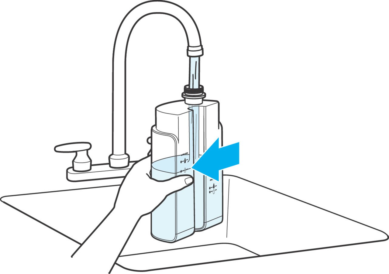 Filling the clean water tank to the large area water line on Bissell Little Green Max Pet