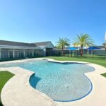 A dog relaxing in a spacious patio suite at Pet Paradise Fort Myers