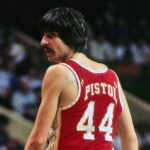 Pete Maravich in action, showcasing his ball-handling skills and signature style