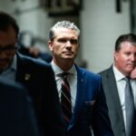 Secretary of Defense nominee Pete Hegseth leaves a meeting with Republican senators at the Capitol.