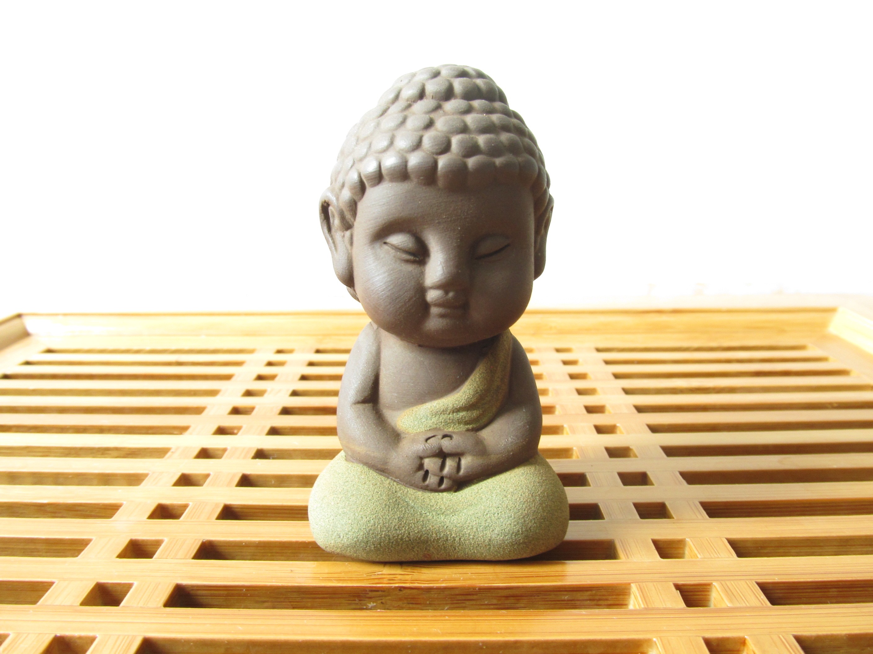 Meditating Buddha tea pet, a favorite from a tea festival.