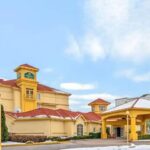 Exterior of La Quinta Inn Airport Salt Lake City, showcasing hotel entrance