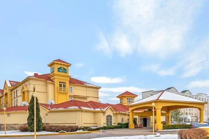 Exterior of La Quinta Inn Airport Salt Lake City, showcasing hotel entrance