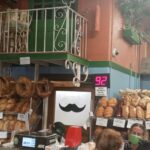 A vibrant display of pastries at Mazzaro's Italian Market bakery in St. Pete, showcasing the fresh and tempting treats.