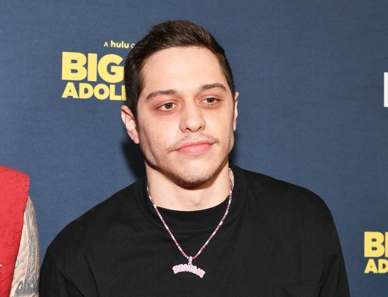 Pete Davidson at a movie premiere, showcasing his public persona and the personal story beneath