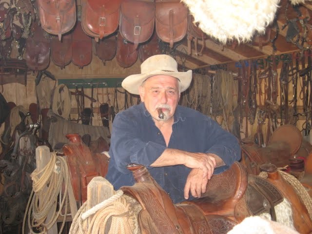 Peter Sherayko and Fred, showcasing his love for dogs and the western lifestyle