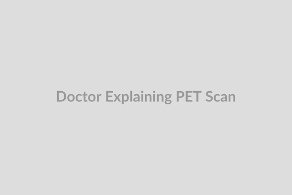 A doctor explaining PET scan results to a patient