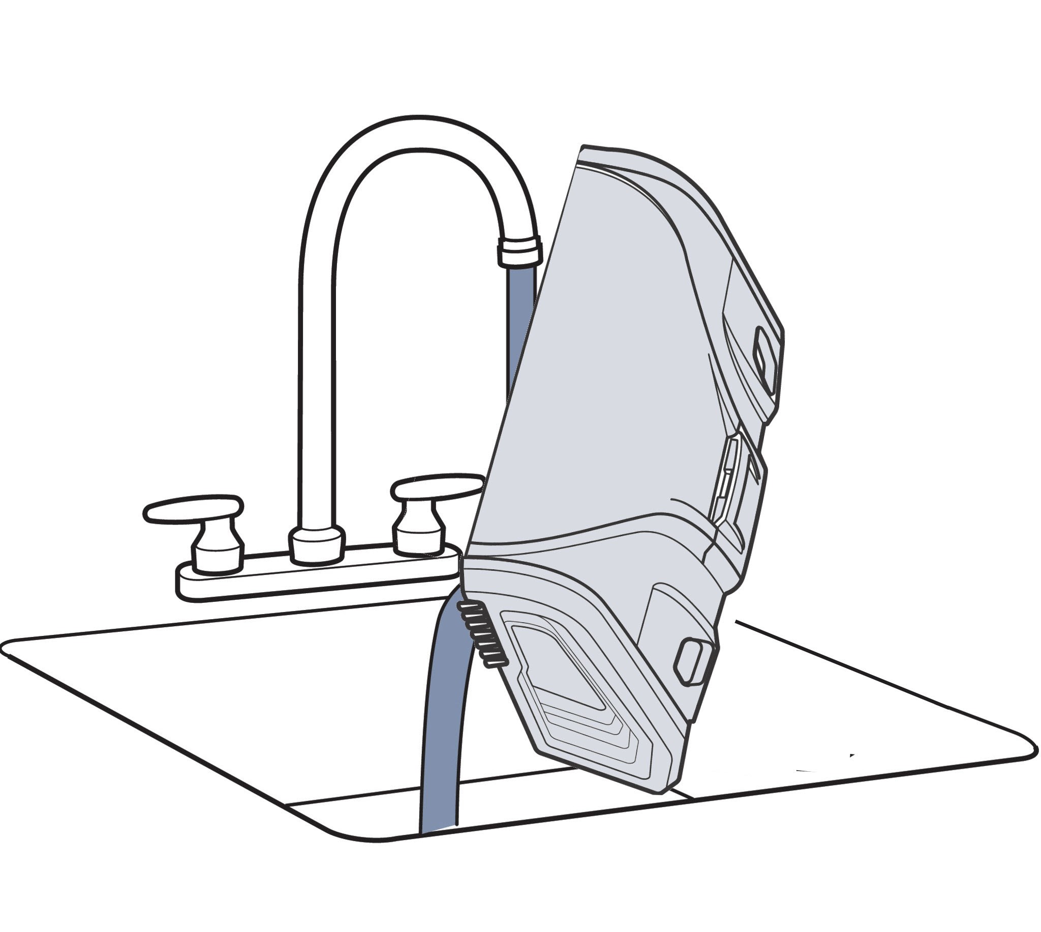 Rinsing the integrated nozzle of a Bissell ProHeat 2X Revolution Pet Pro in a sink to clean spray tips