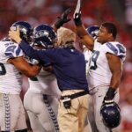 Pete Carroll congratulates players