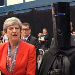 UK Prime Minister Theresa May with Lord Buckethead during the 2017 General Election, a campaign critiqued in an article referencing Pete North's "Tory Brexit Taliban" term in Brexit discussions.