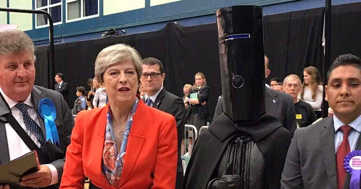 UK Prime Minister Theresa May with Lord Buckethead during the 2017 General Election, a campaign critiqued in an article referencing Pete North's "Tory Brexit Taliban" term in Brexit discussions.