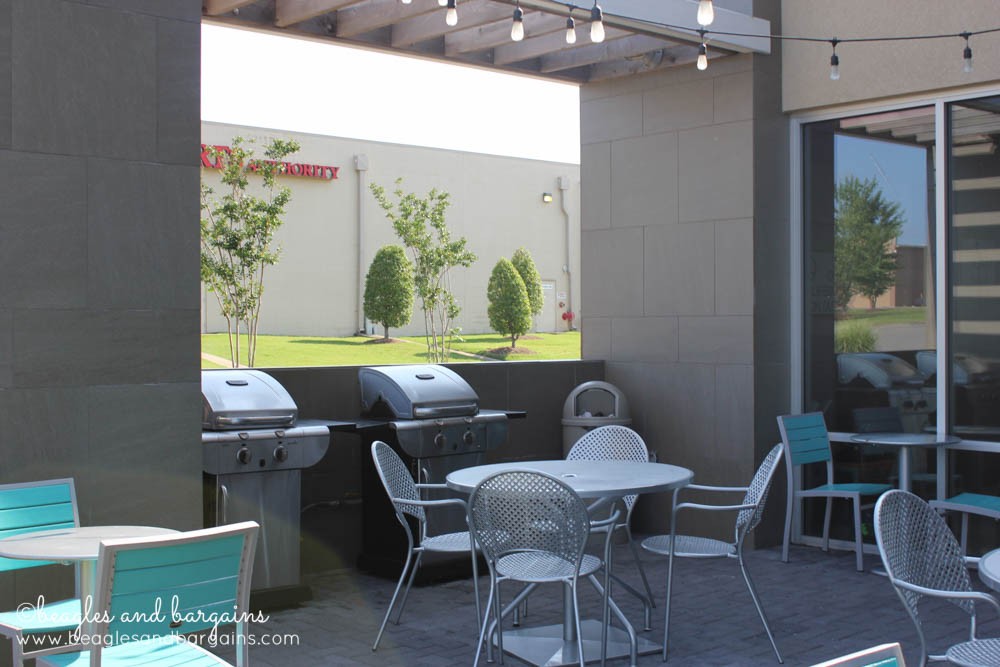 BBQ grills and a pool are just a few Home2 Suites amenities.